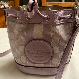 Small purple bucket coach bag